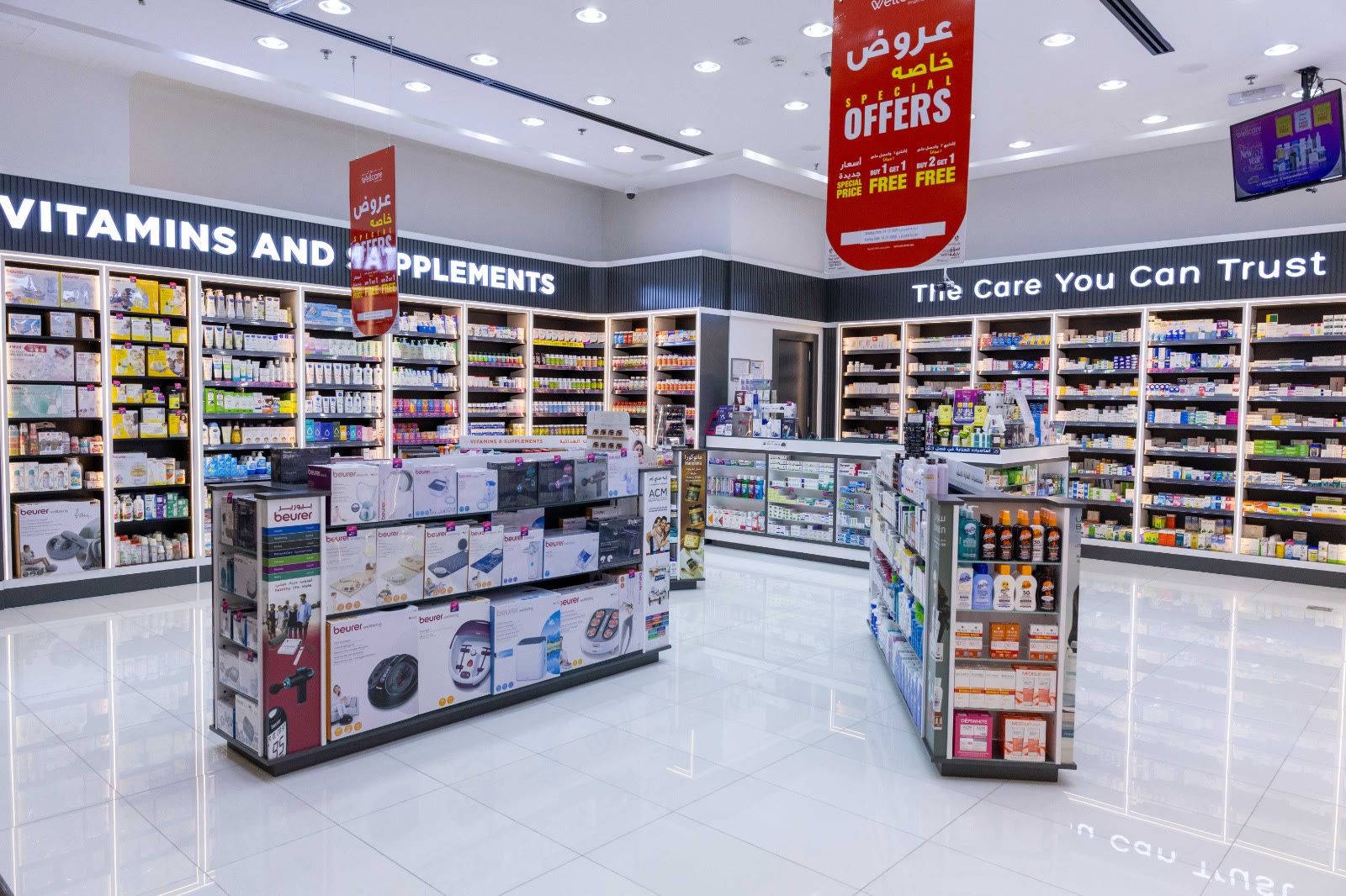 Pharmacy aisles with special offers banners